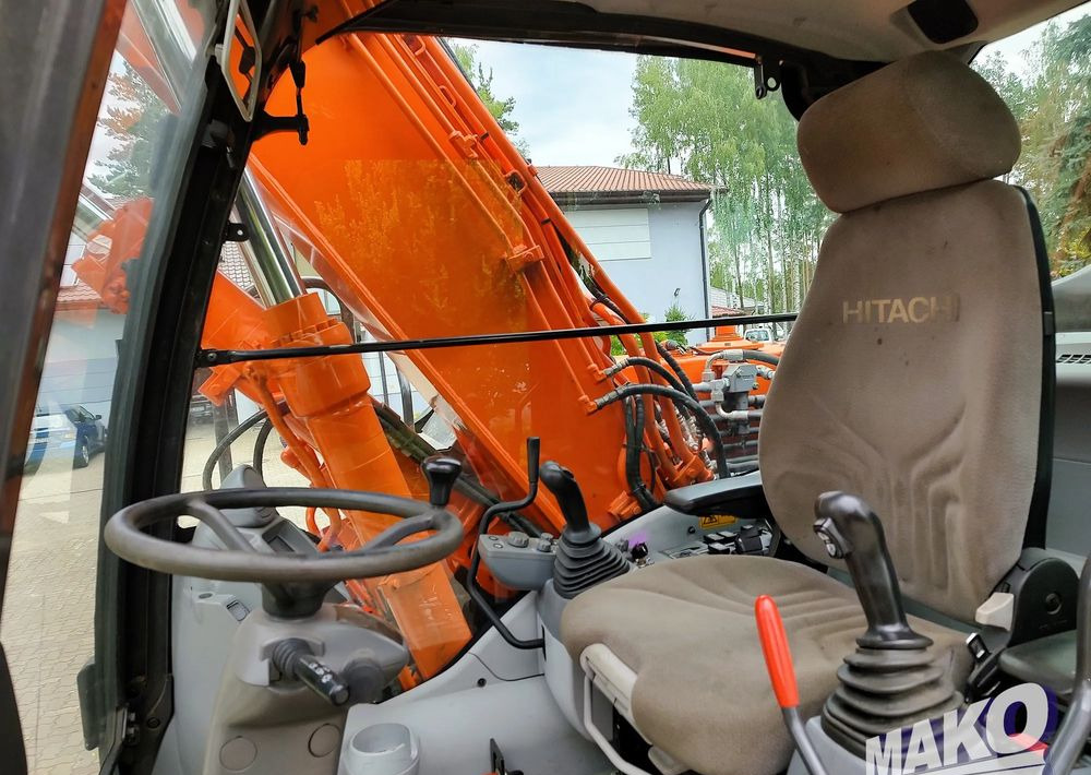Ratastel ekskavaator Hitachi ZX 140: pilt 11