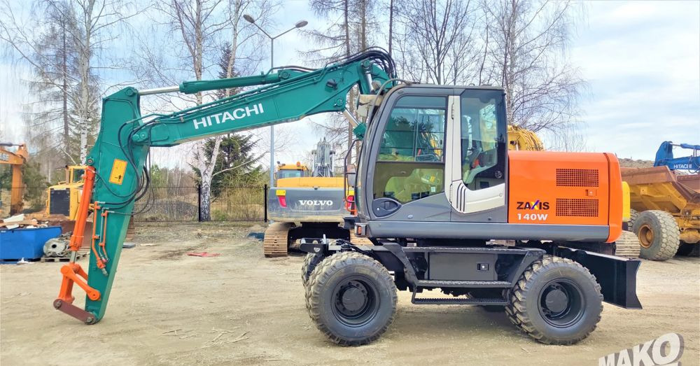 Hitachi ZX140W-3 - Ratastel ekskavaator: pilt 1 Hitachi ZX140W-3 - Ratastel ekskavaator: pilt 1