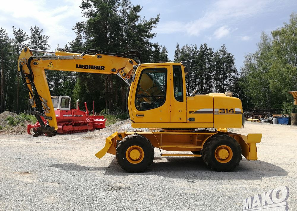 Liebherr A 314 Litronic - Ratastel ekskavaator: pilt 2 Liebherr A 314 Litronic - Ratastel ekskavaator: pilt 2