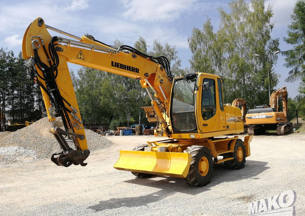 Liebherr A 314 Litronic - Ratastel ekskavaator: pilt 1 Liebherr A 314 Litronic - Ratastel ekskavaator: pilt 1