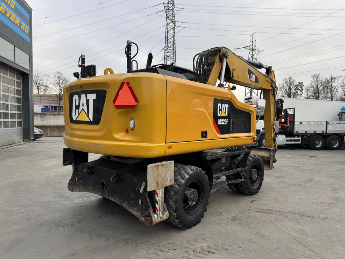 CATERPILLAR M320F Oilquick - Ratastel ekskavaator: pilt 4 CATERPILLAR M320F Oilquick - Ratastel ekskavaator: pilt 4