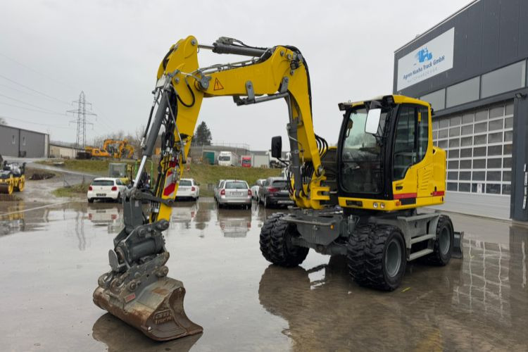 Liebherr 910 Compact Litronic Powertilt - Ratastel ekskavaator: pilt 1 Liebherr 910 Compact Litronic Powertilt - Ratastel ekskavaator: pilt 1
