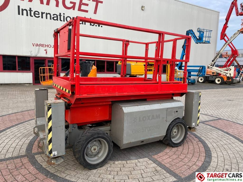 Genie GS-2668RT Diesel 4x4 Scissor Work Lift 992cm - Käärlift: pilt 1 Genie GS-2668RT Diesel 4x4 Scissor Work Lift 992cm - Käärlift: pilt 1
