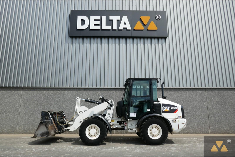 Caterpillar 906M - Rataslaadur: pilt 1 Caterpillar 906M - Rataslaadur: pilt 1