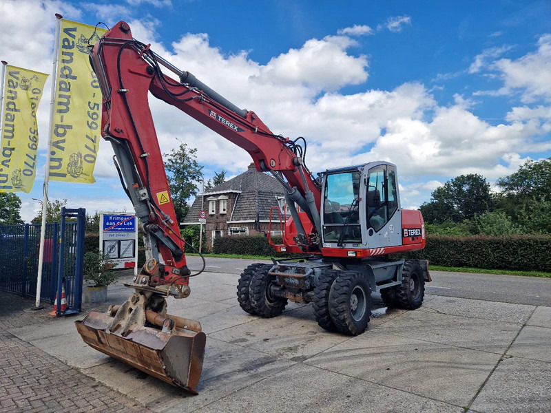 Terex TW160 inclusief kantelbak (1.98m.) - Ratastel ekskavaator: pilt 1 Terex TW160 inclusief kantelbak (1.98m.) - Ratastel ekskavaator: pilt 1