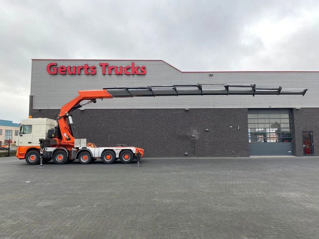 DAF XF 105 10X4 + FASSI F1500AXP.28 KRAAN/KRAN/CRANE - Kraanaga veoauto: pilt 1 DAF XF 105 10X4 + FASSI F1500AXP.28 KRAAN/KRAN/CRANE - Kraanaga veoauto: pilt 1