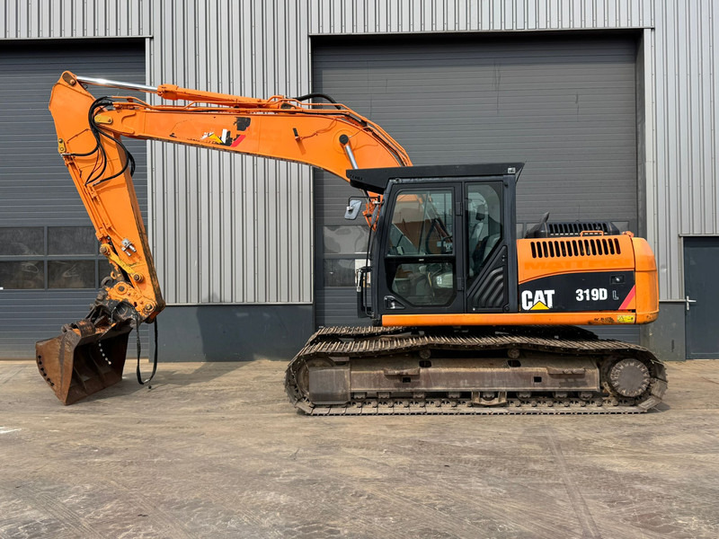 Caterpillar 319DL - Lintekskavaator: pilt 1 Caterpillar 319DL - Lintekskavaator: pilt 1