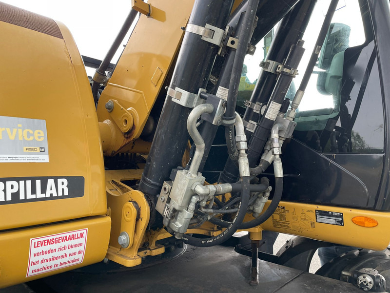 Ratastel ekskavaator Caterpillar M313D - CE: pilt 19