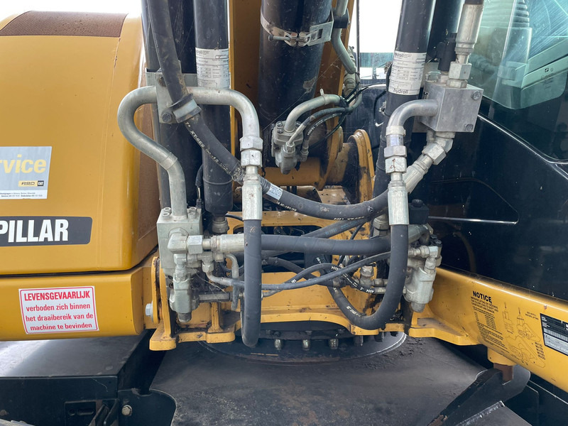 Ratastel ekskavaator Caterpillar M313D - CE: pilt 17