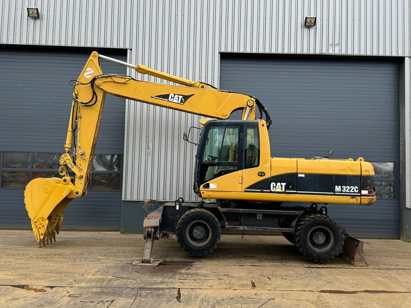 Caterpillar M322C - Hydraulic stabilizers / VA Triple boom / CE-certified, - Ratastel ekskavaator: pilt 1 Caterpillar M322C - Hydraulic stabilizers / VA Triple boom / CE-certified, - Ratastel ekskavaator: pilt 1