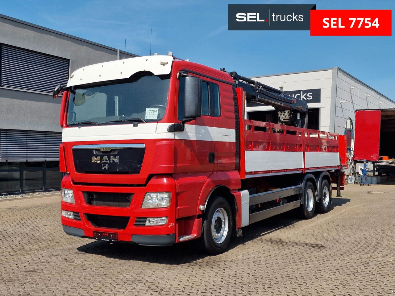 MAN TGX 26.400 6x2-2 BL/ Intarder / HIAB / Lenkachse - Kraanaga veoauto: pilt 1 MAN TGX 26.400 6x2-2 BL/ Intarder / HIAB / Lenkachse - Kraanaga veoauto: pilt 1