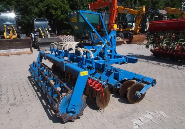 Agregat uprawowo-siewny Rabe Werk 2011 3m brona talerzowa z siewnikiem do poplonów - Kombain-külvimasin: pilt 5 Agregat uprawowo-siewny Rabe Werk 2011 3m brona talerzowa z siewnikiem do poplonów - Kombain-külvimasin: pilt 5