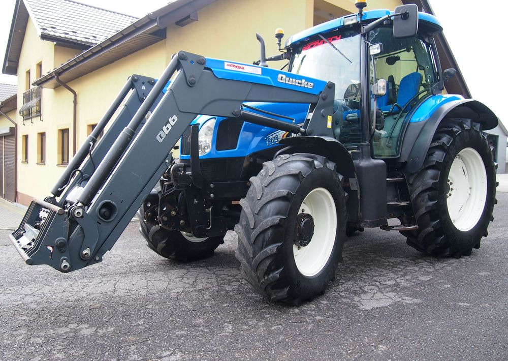 Ciągnik New Holland NH TS125A 6 cylindrów 2004 Ciągnik rolniczy New Holland TS125A - Traktor: pilt 1 Ciągnik New Holland NH TS125A 6 cylindrów 2004 Ciągnik rolniczy New Holland TS125A - Traktor: pilt 1