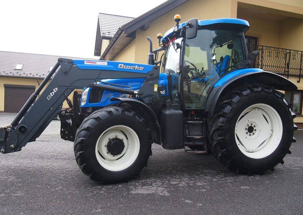 Ciągnik New Holland NH TS125A 6 cylindrów 2004 Ciągnik rolniczy New Holland TS125A - Traktor: pilt 3 Ciągnik New Holland NH TS125A 6 cylindrów 2004 Ciągnik rolniczy New Holland TS125A - Traktor: pilt 3