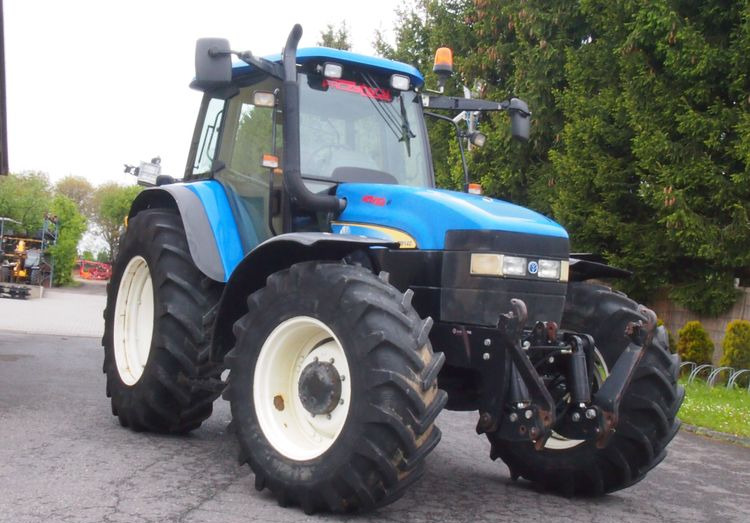 Ciągnik New Holland TM 140 2004 Przedni TUZ - Traktor: pilt 2 Ciągnik New Holland TM 140 2004 Przedni TUZ - Traktor: pilt 2