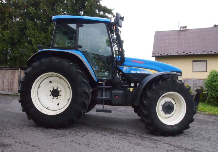 Ciągnik New Holland TM 140 2004 Przedni TUZ - Traktor: pilt 4 Ciągnik New Holland TM 140 2004 Przedni TUZ - Traktor: pilt 4