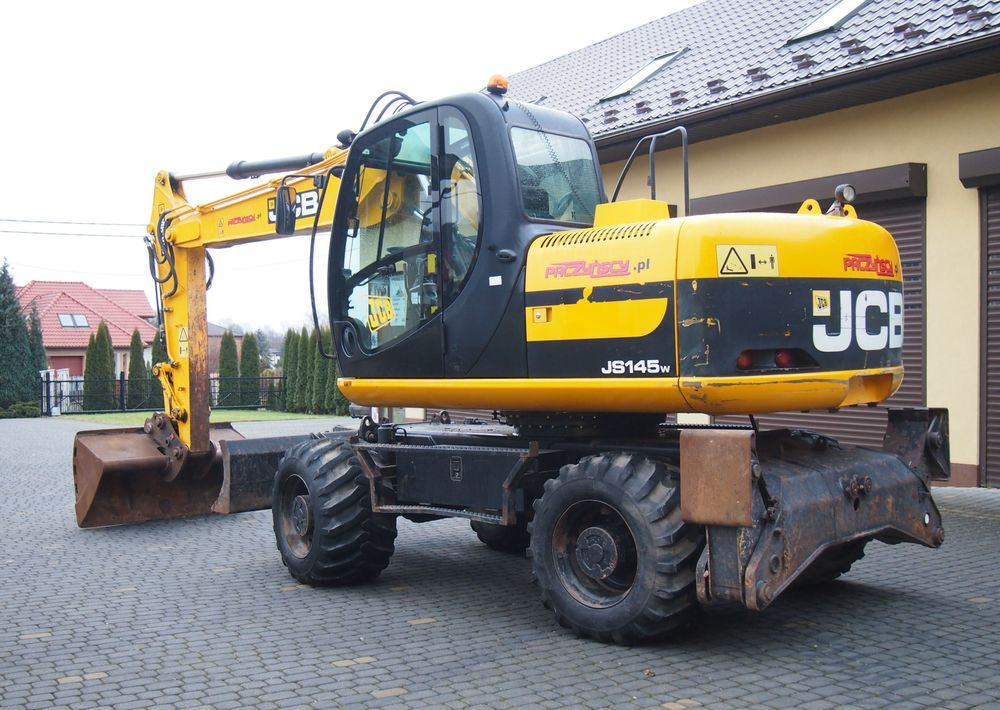 Koparka kołowa JCB JS145W 2011 Koparka JCB - Ratastel ekskavaator: pilt 5 Koparka kołowa JCB JS145W 2011 Koparka JCB - Ratastel ekskavaator: pilt 5