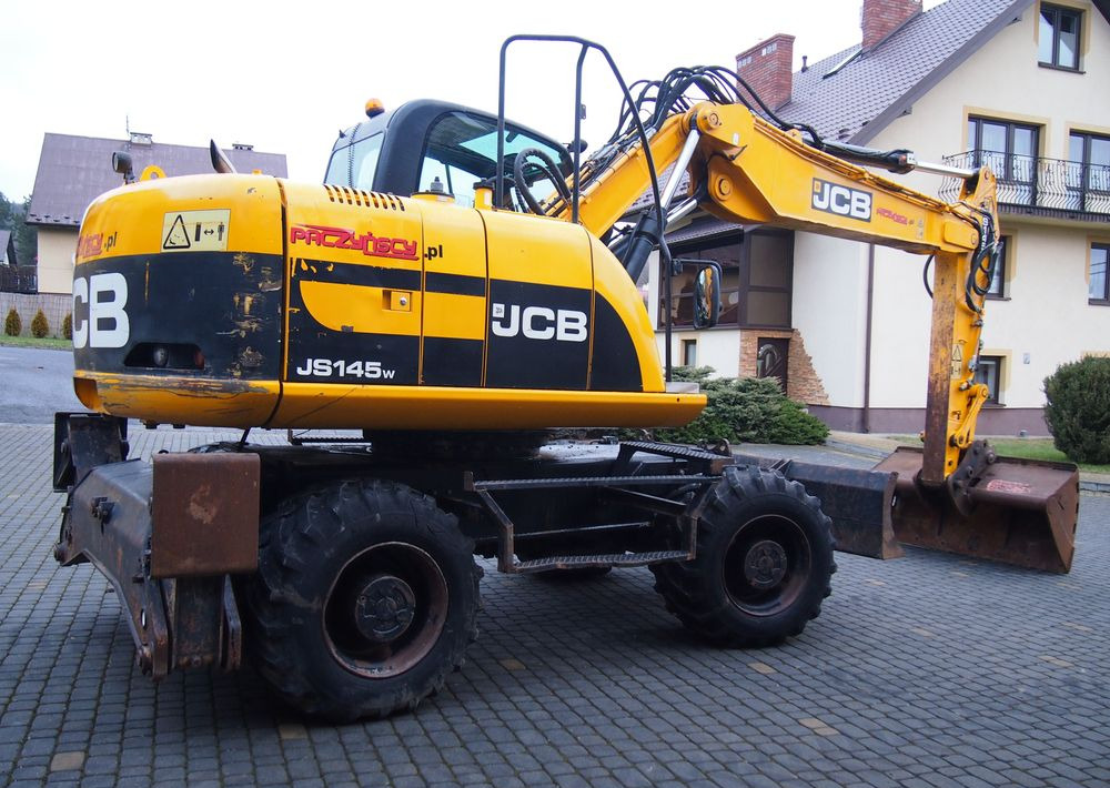 Koparka kołowa JCB JS145W 2011 Koparka JCB - Ratastel ekskavaator: pilt 2 Koparka kołowa JCB JS145W 2011 Koparka JCB - Ratastel ekskavaator: pilt 2