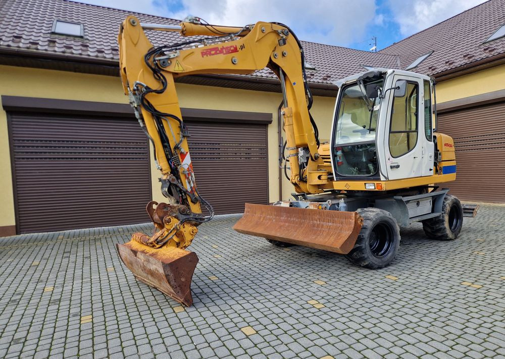 Koparka kołowa Liebherr A311 2008 Liebherr - Ratastel ekskavaator: pilt 1 Koparka kołowa Liebherr A311 2008 Liebherr - Ratastel ekskavaator: pilt 1