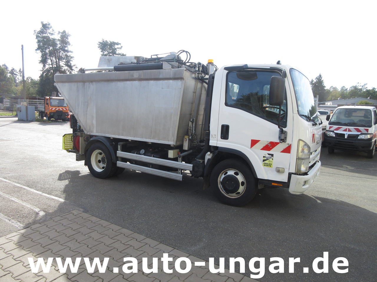 Isuzu NPR 75 Müllwagen Provence Benne - Faun Lifter Presse Kipper Trittbrett Bj 12 - Prügiauto: pilt 1 Isuzu NPR 75 Müllwagen Provence Benne - Faun Lifter Presse Kipper Trittbrett Bj 12 - Prügiauto: pilt 1