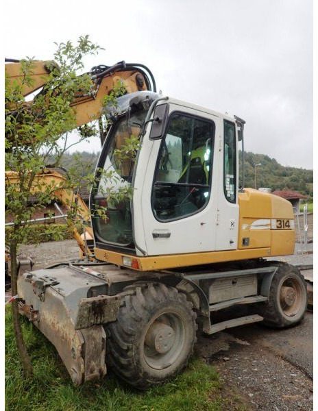 Liebherr A 314 - Ratastel ekskavaator: pilt 1 Liebherr A 314 - Ratastel ekskavaator: pilt 1
