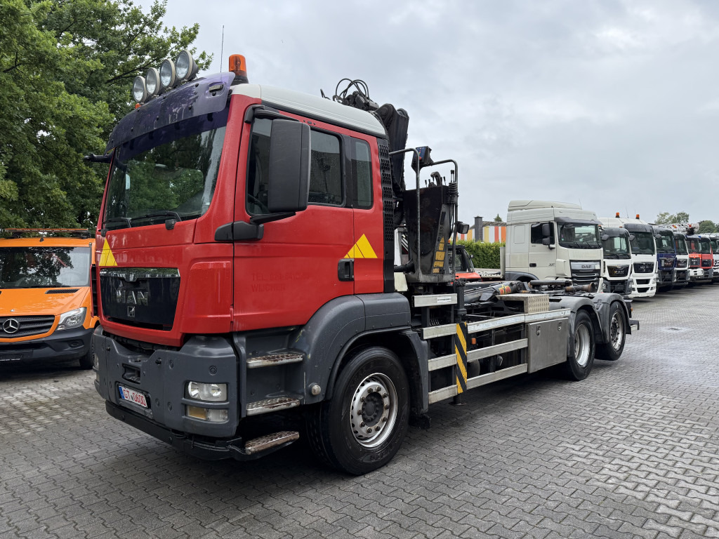 MAN TGS 26.360 6X2 Haken mit Kran HMF 1643Z - Konkstõstukiga veoauto, Kraanaga veoauto: pilt 1 MAN TGS 26.360 6X2 Haken mit Kran HMF 1643Z - Konkstõstukiga veoauto, Kraanaga veoauto: pilt 1