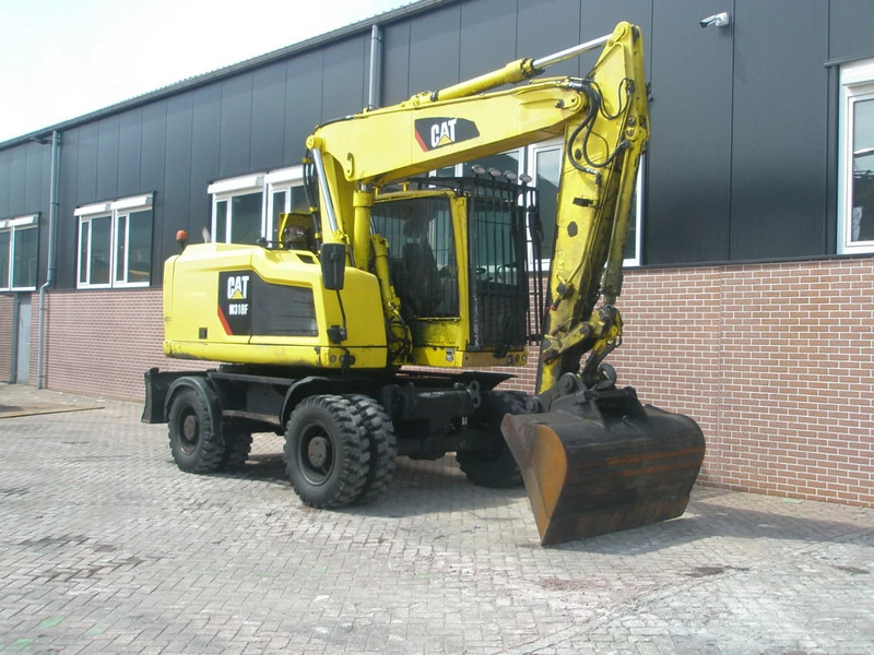 Caterpillar M318F - Ratastel ekskavaator: pilt 4 Caterpillar M318F - Ratastel ekskavaator: pilt 4