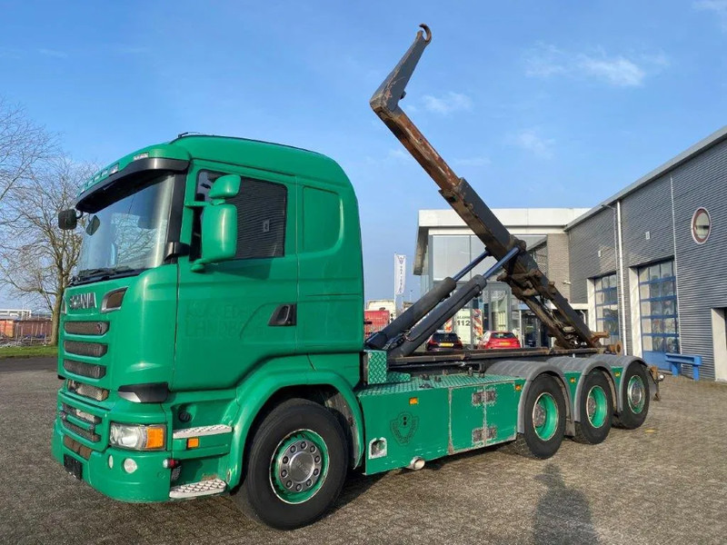 Scania R520 V8 / 8X4 / BIG AXLE / AJK HOOKLIFT 30TON / LIFT+LENKACHSE / NAVI / LEATHER / FULL-AIR / AUTOMATIC / EURO-6 / 2015 - Konkstõstukiga veoauto: pilt 1 Scania R520 V8 / 8X4 / BIG AXLE / AJK HOOKLIFT 30TON / LIFT+LENKACHSE / NAVI / LEATHER / FULL-AIR / AUTOMATIC / EURO-6 / 2015 - Konkstõstukiga veoauto: pilt 1