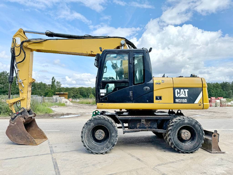 Cat M315D - Triple Boom / Quick Coupler - Ratastel ekskavaator: pilt 1 Cat M315D - Triple Boom / Quick Coupler - Ratastel ekskavaator: pilt 1