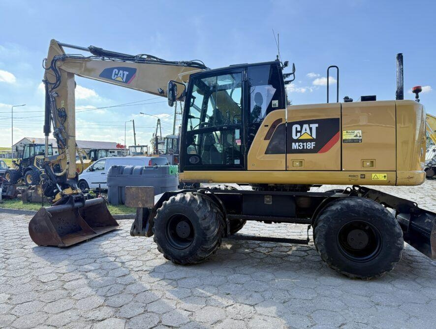 CAT M318F - Ratastel ekskavaator: pilt 1 CAT M318F - Ratastel ekskavaator: pilt 1