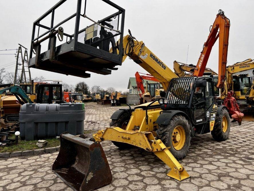 Komatsu WH714 H kosz - Teleskooplaadur: pilt 1 Komatsu WH714 H kosz - Teleskooplaadur: pilt 1