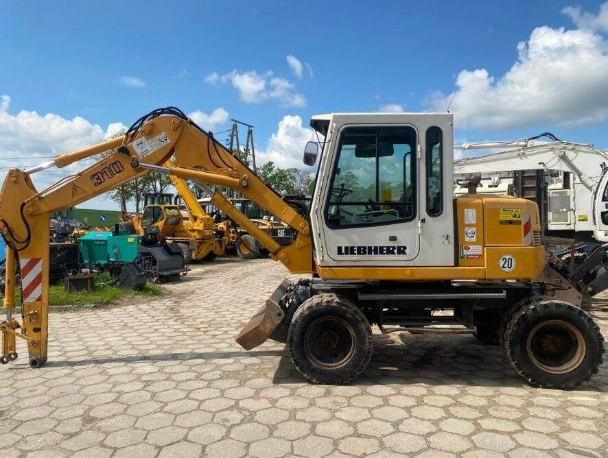 Liebherr A310B - Ratastel ekskavaator: pilt 2 Liebherr A310B - Ratastel ekskavaator: pilt 2