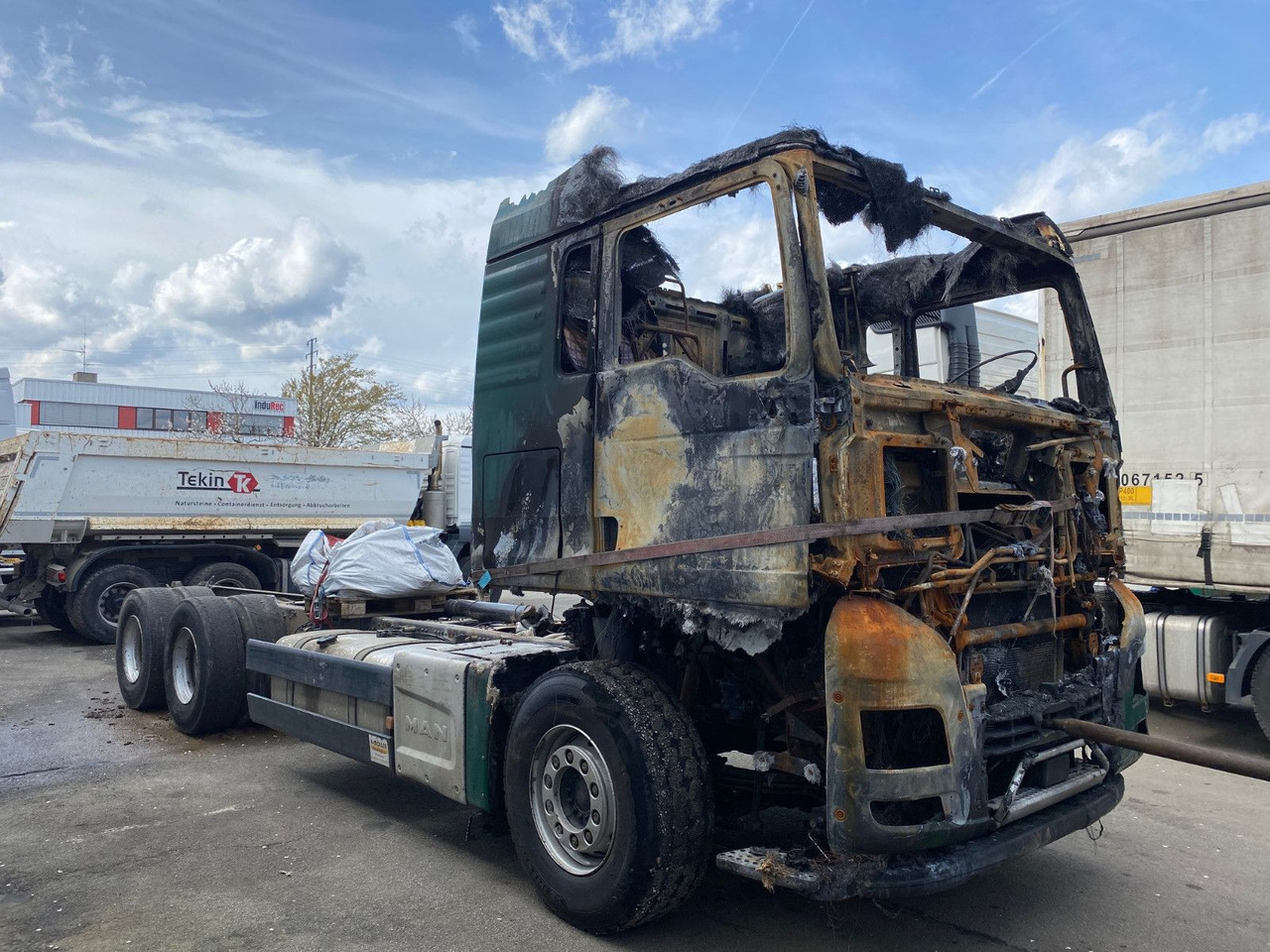 MAN TGX 26.580 Verbrannt 6x4 - Kabiinišassiiga veoauto: pilt 1 MAN TGX 26.580 Verbrannt 6x4 - Kabiinišassiiga veoauto: pilt 1