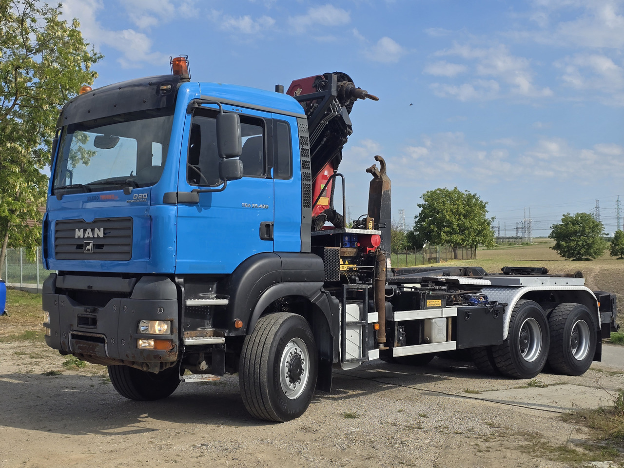MAN TGA 33.430 6X6 / HMF 1823 K3+REM.CON./ HOOK SYSTEM 2x in stock - Konkstõstukiga veoauto, Kraanaga veoauto: pilt 3 MAN TGA 33.430 6X6 / HMF 1823 K3+REM.CON./ HOOK SYSTEM 2x in stock - Konkstõstukiga veoauto, Kraanaga veoauto: pilt 3