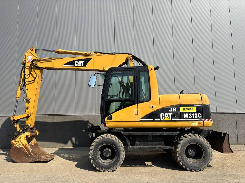 CAT M 313 C (Low verified hours) - Ratastel ekskavaator: pilt 1 CAT M 313 C (Low verified hours) - Ratastel ekskavaator: pilt 1