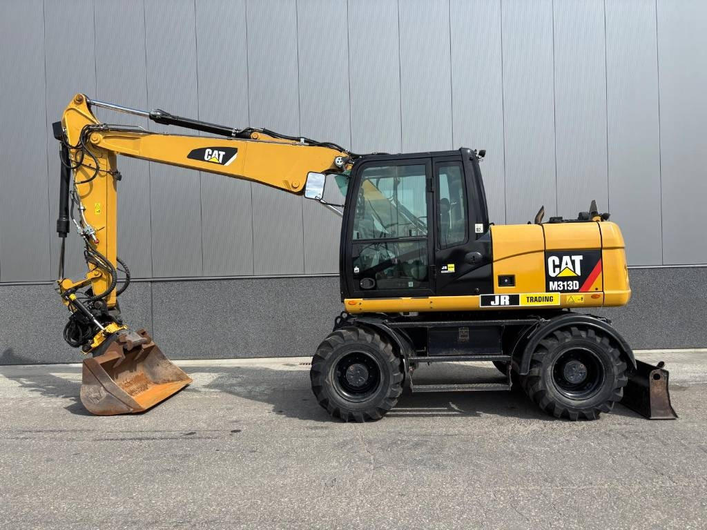 CAT M 313 D - Ratastel ekskavaator: pilt 1 CAT M 313 D - Ratastel ekskavaator: pilt 1