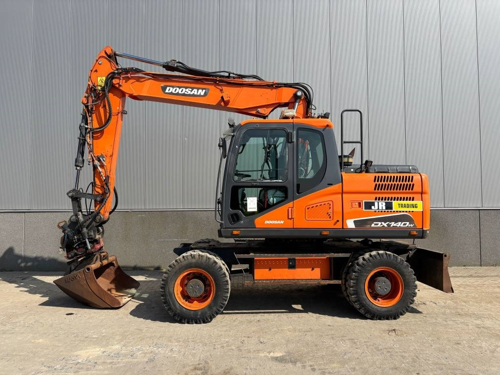 Doosan DX 140 W-5 (R5 Rototilt) - Ratastel ekskavaator: pilt 1 Doosan DX 140 W-5 (R5 Rototilt) - Ratastel ekskavaator: pilt 1