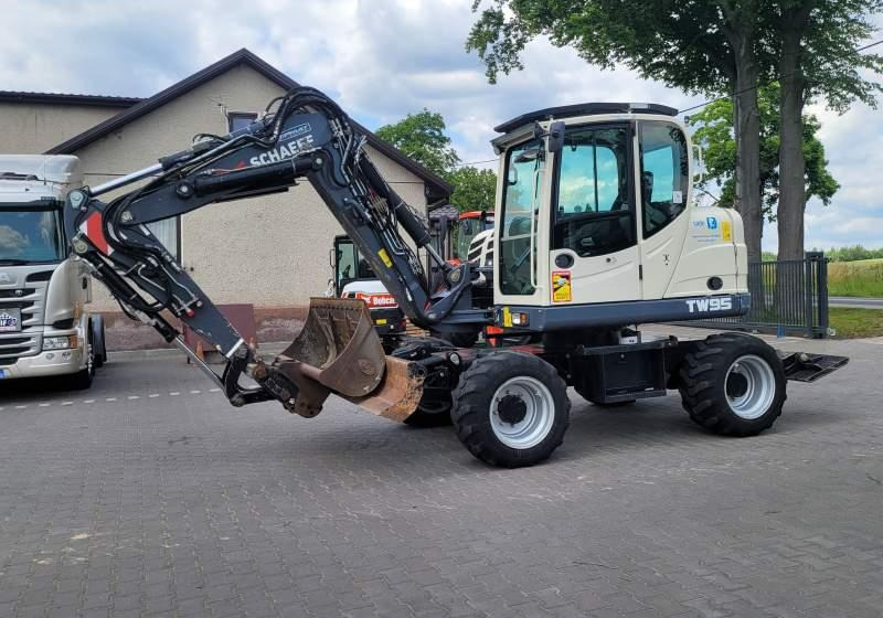 Schaeff TW95 / SPROWADZONA Z FRANCJI/ 6 500 MTH - Ratastel ekskavaator: pilt 1 Schaeff TW95 / SPROWADZONA Z FRANCJI/ 6 500 MTH - Ratastel ekskavaator: pilt 1