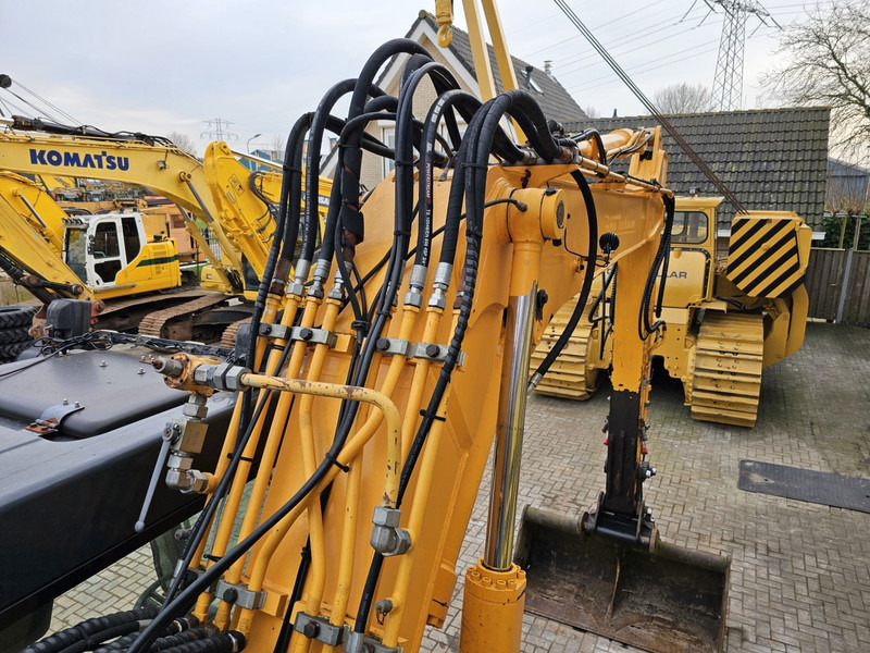 Ratastel ekskavaator Hyundai R140W-7A: pilt 9