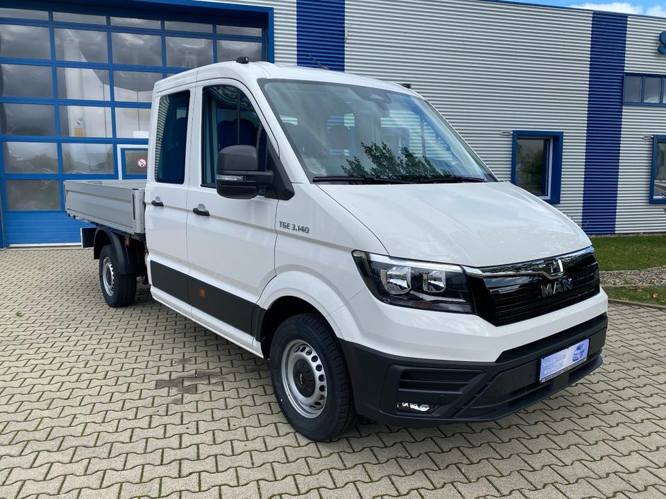 MAN TGE 3.140 Doka Pritsche Next Level *TEMPO*KLIMA*CAM*AHK*APP*PDC*INKL.19% MWST*SOFORT!* - Madelauto, Meeskonnaauto: pilt 2 MAN TGE 3.140 Doka Pritsche Next Level *TEMPO*KLIMA*CAM*AHK*APP*PDC*INKL.19% MWST*SOFORT!* - Madelauto, Meeskonnaauto: pilt 2