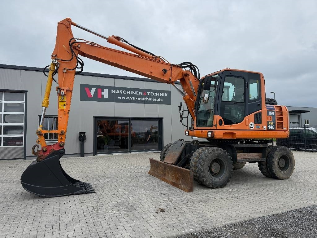 Komatsu PW 148-8 - Ratastel ekskavaator: pilt 1 Komatsu PW 148-8 - Ratastel ekskavaator: pilt 1
