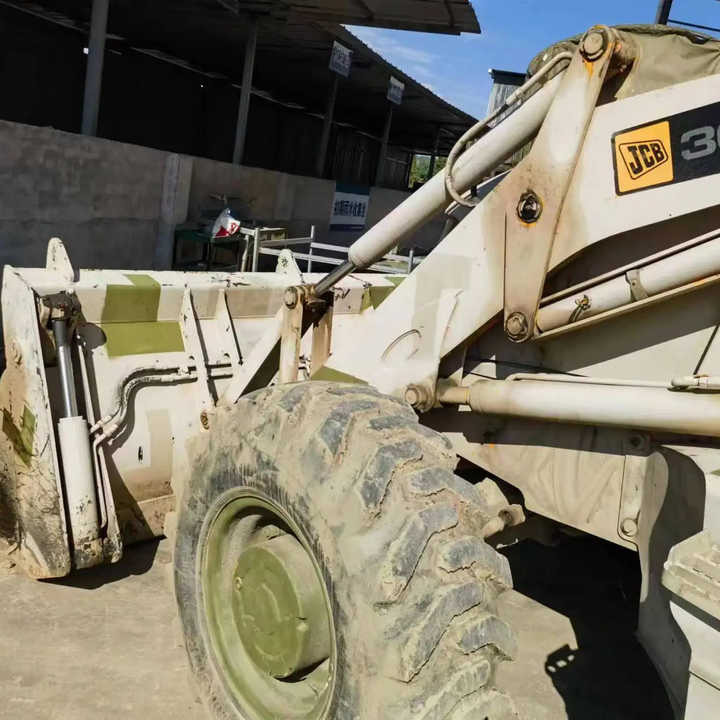 Hot sale Backhoe loader JCB 3CX 4*4 tlb loader UKmade, used cheap JCB 3CX retro loader and digger in good condition - Ekskavaator-laadur: pilt 1 Hot sale Backhoe loader JCB 3CX 4*4 tlb loader UKmade, used cheap JCB 3CX retro loader and digger in good condition - Ekskavaator-laadur: pilt 1