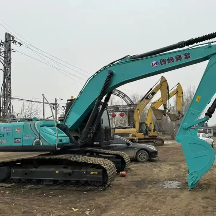 Large Second-Hand Excavators Kobelco Sk200 SK210 20ton with EPA and CE on Sale in Japan - Ekskavaator: pilt 1 Large Second-Hand Excavators Kobelco Sk200 SK210 20ton with EPA and CE on Sale in Japan - Ekskavaator: pilt 1