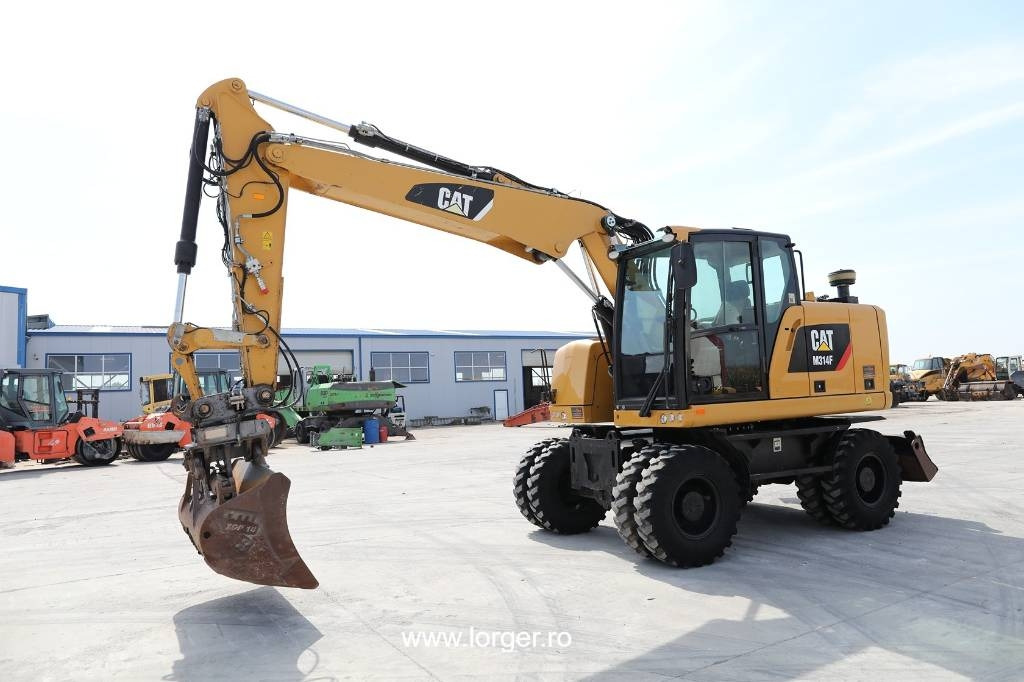 CAT M 314 F - Ratastel ekskavaator: pilt 1 CAT M 314 F - Ratastel ekskavaator: pilt 1