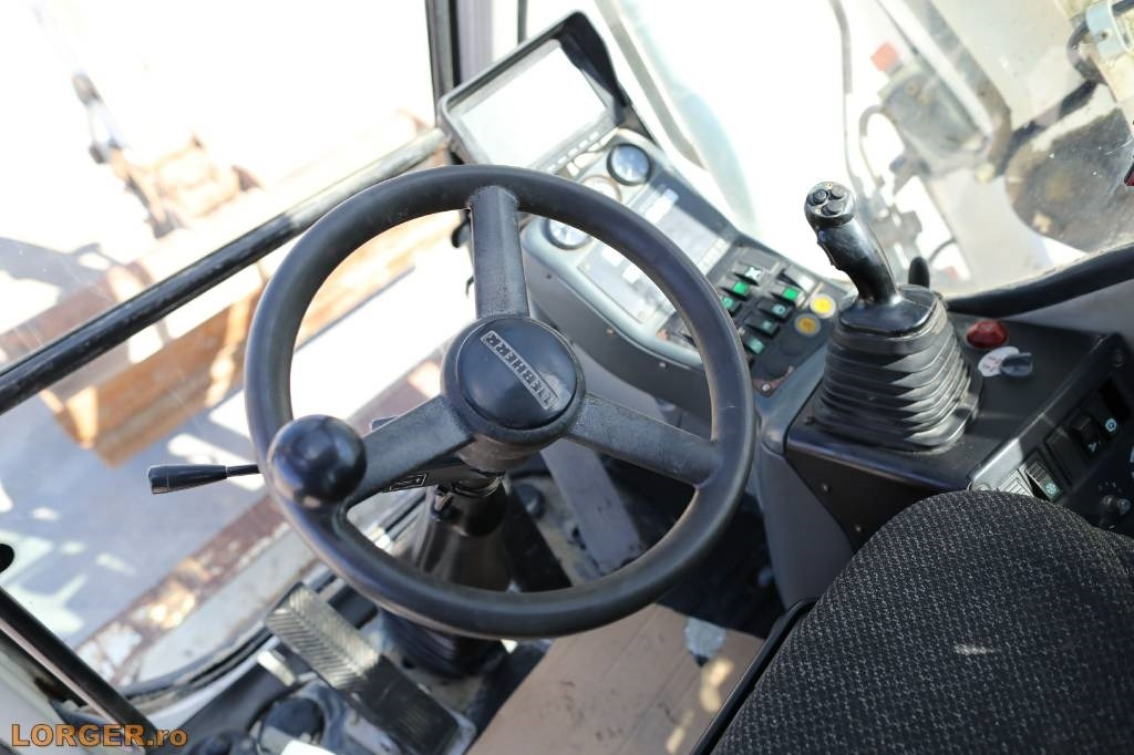 Ratastel ekskavaator Liebherr A 314: pilt 12