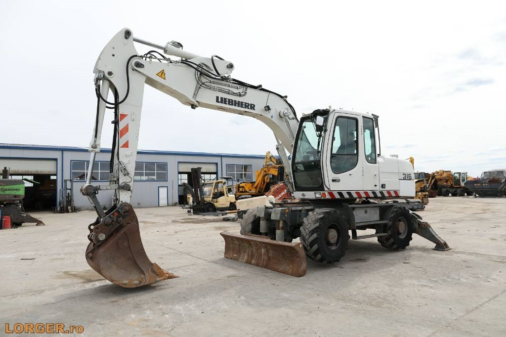 Liebherr A 316 Litronic - Ratastel ekskavaator: pilt 5 Liebherr A 316 Litronic - Ratastel ekskavaator: pilt 5