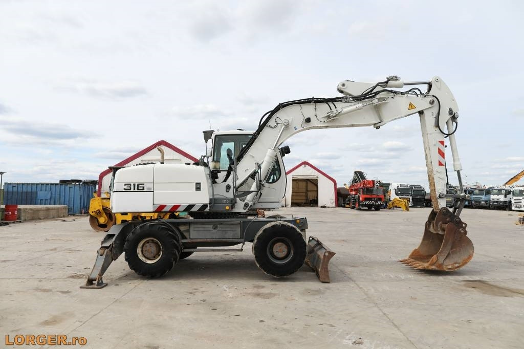 Liebherr A 316 Litronic - Ratastel ekskavaator: pilt 1 Liebherr A 316 Litronic - Ratastel ekskavaator: pilt 1