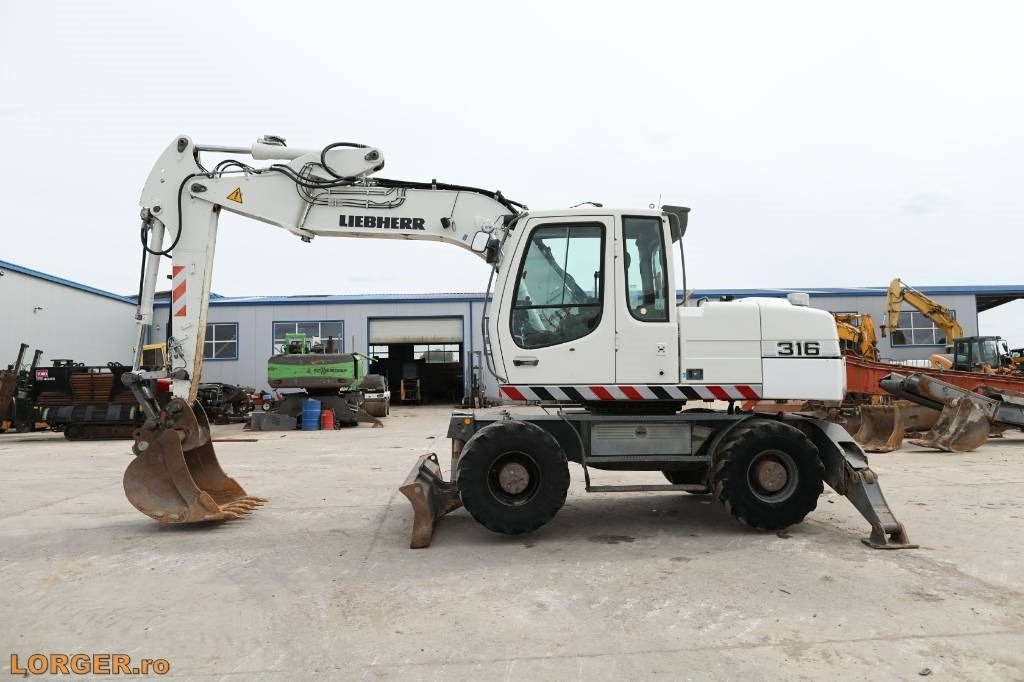 Liebherr A 316 Litronic - Ratastel ekskavaator: pilt 4 Liebherr A 316 Litronic - Ratastel ekskavaator: pilt 4