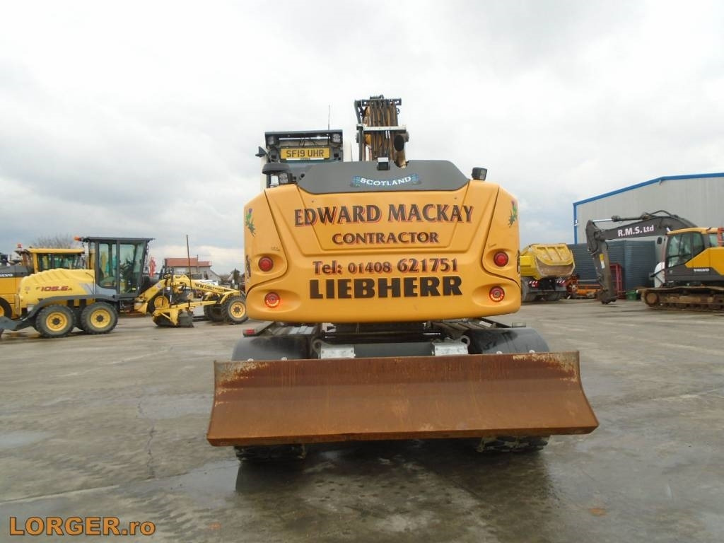 Ratastel ekskavaator Liebherr A 914: pilt 7