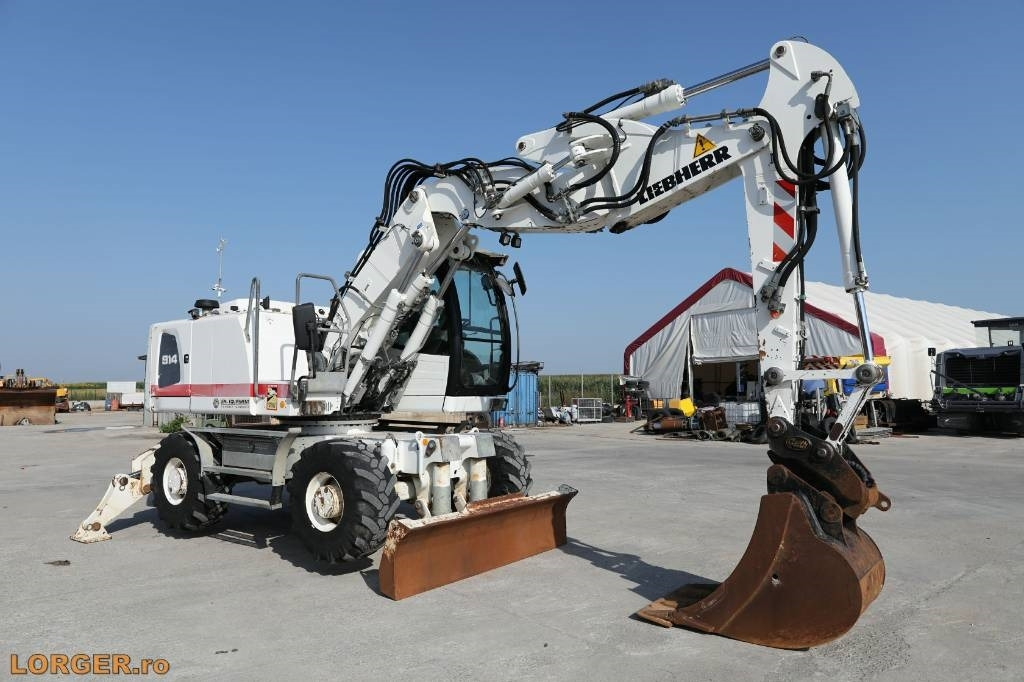 Liebherr A 914 - Ratastel ekskavaator: pilt 1 Liebherr A 914 - Ratastel ekskavaator: pilt 1